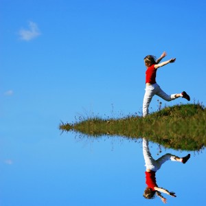 Woman Jumping - Grass.Sky